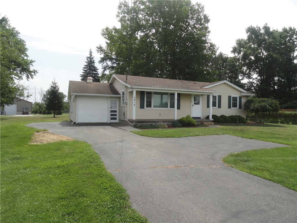 3816 Sweden Walker Road Clarkson, NY 14420 - Photo 1 of 1 100 x 200 lot offers blacktop alongside the garage