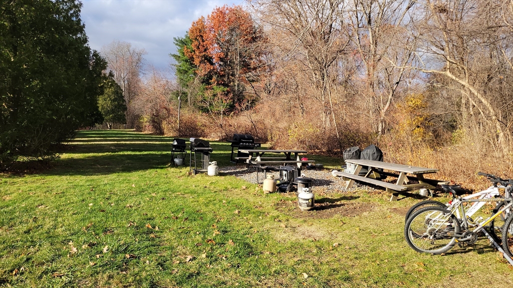 3 Leonard Road, Unit 3 Boxborough, MA 01719 - Photo 28 of 31 a view of a lake with a park