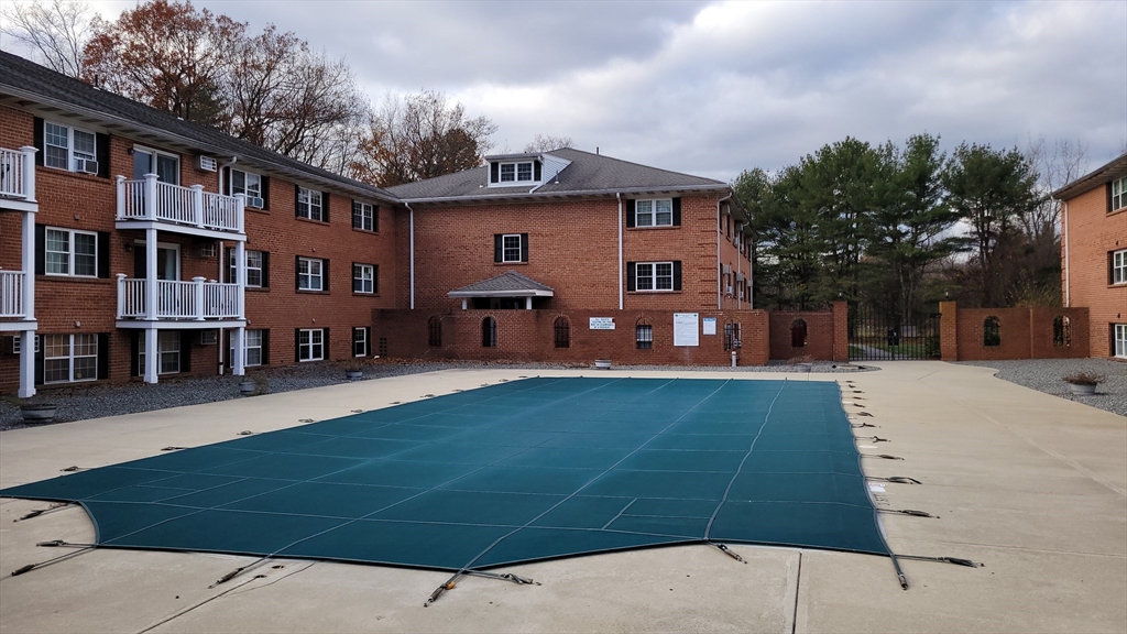 3 Leonard Road, Unit 3 Boxborough, MA 01719 - Photo 31 of 31 a front view of a house with a yard