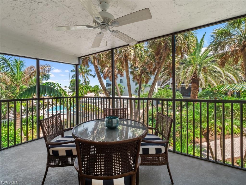 3113 Tennis Villas Captiva, FL 33924 - Photo 16 of 48 a view of a balcony with furniture
