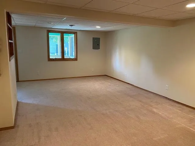 an empty room with windows