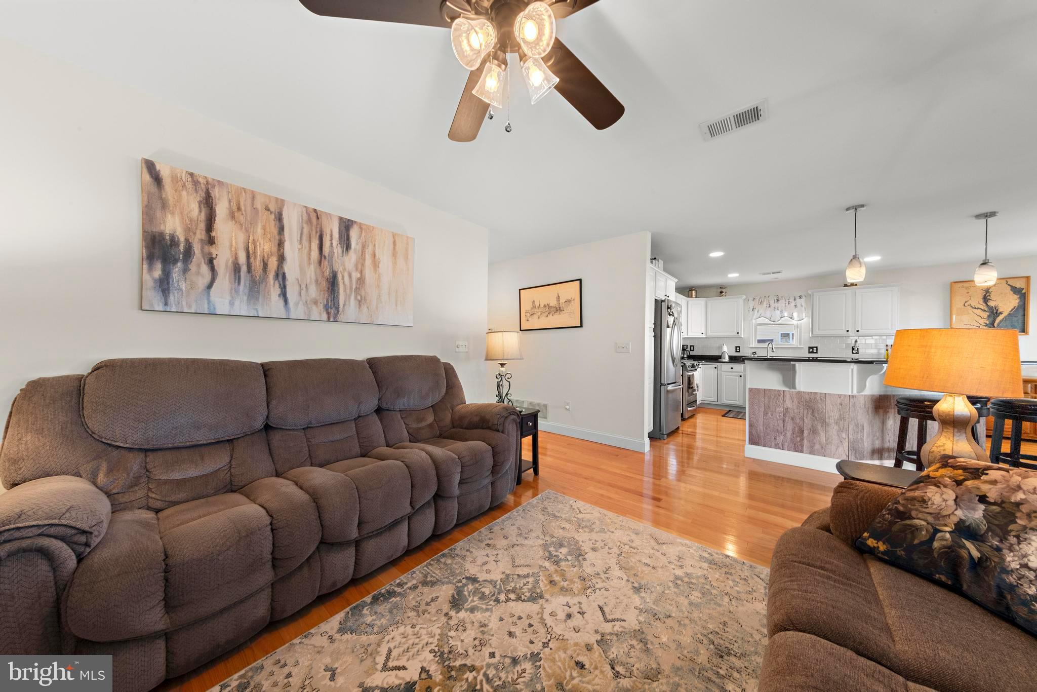 32 West Navasink Drive Little Egg Harbor, NJ 08087 - Photo 18 of 71 a living room with furniture and a chandelier