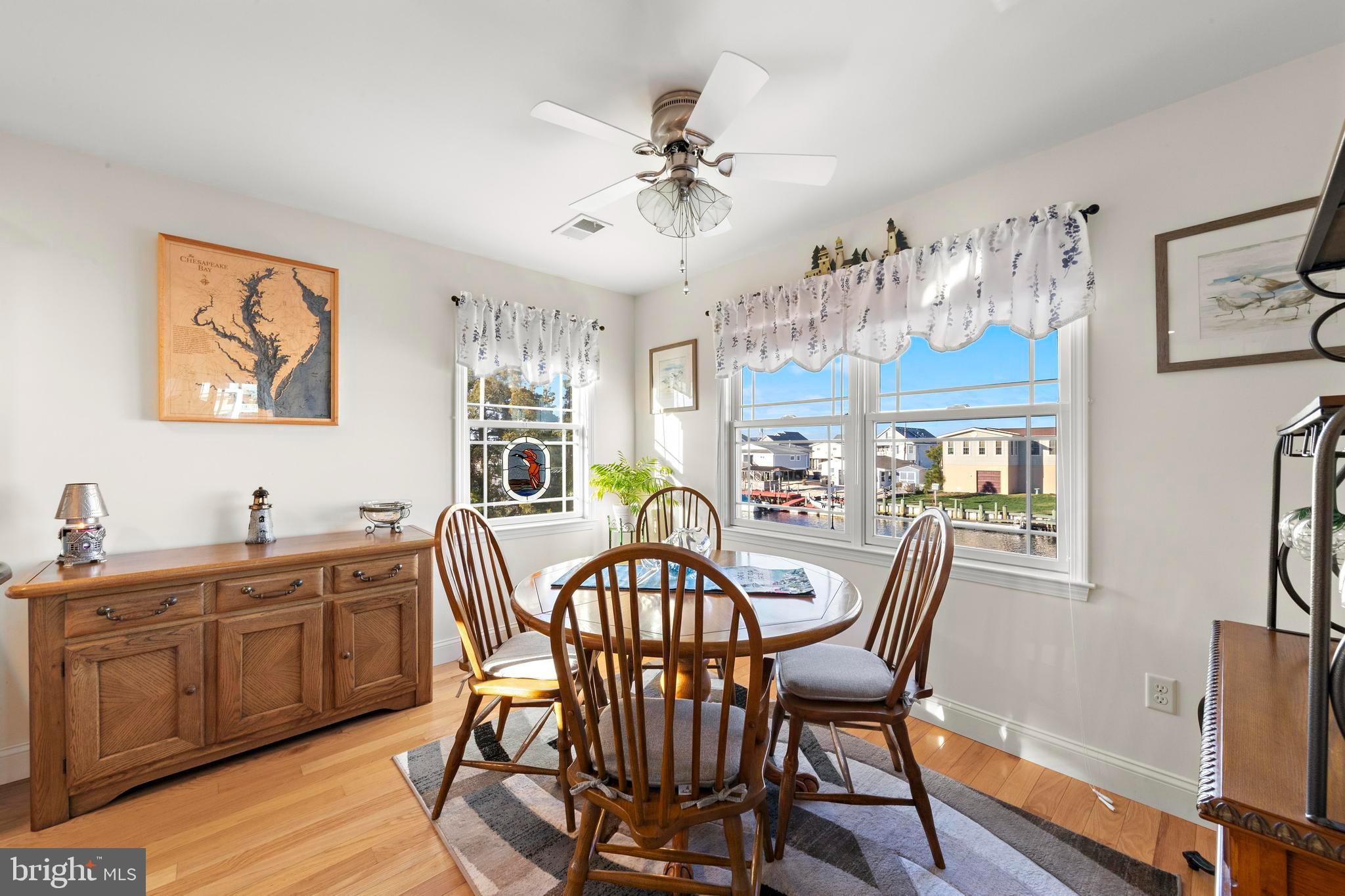32 West Navasink Drive Little Egg Harbor, NJ 08087 - Photo 19 of 71 a view of a dining room with furniture and wooden floor