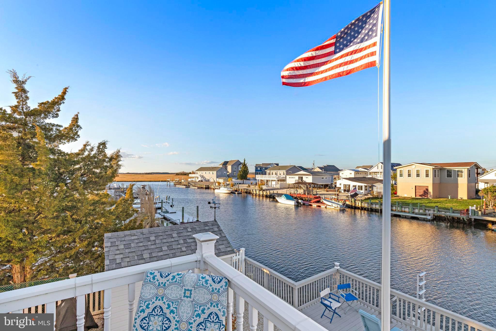 32 West Navasink Drive Little Egg Harbor, NJ 08087 - Photo 31 of 71 Charming waterfront view with American pride.