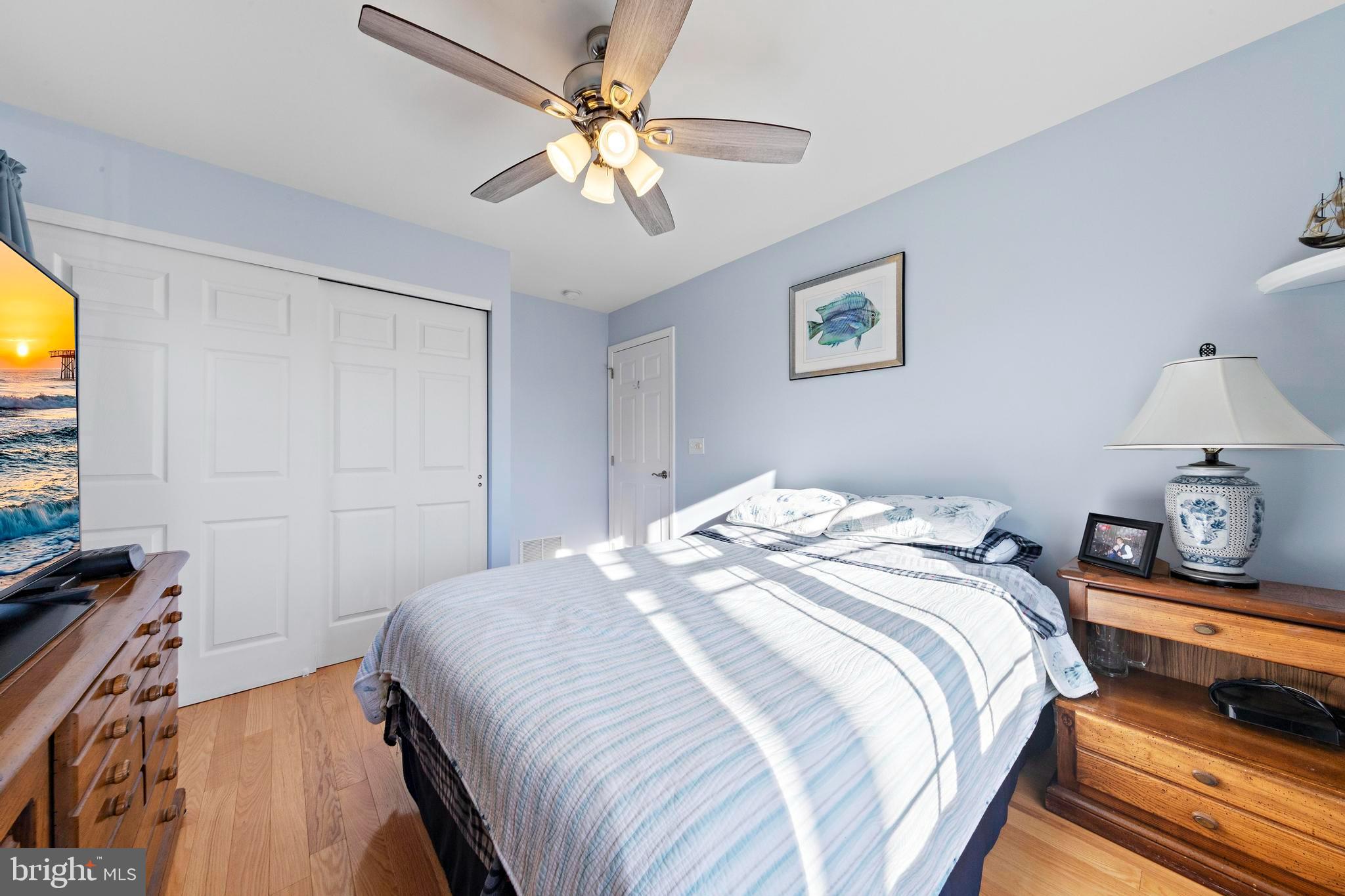 32 West Navasink Drive Little Egg Harbor, NJ 08087 - Photo 42 of 71 a bedroom with a bed and a flat screen tv