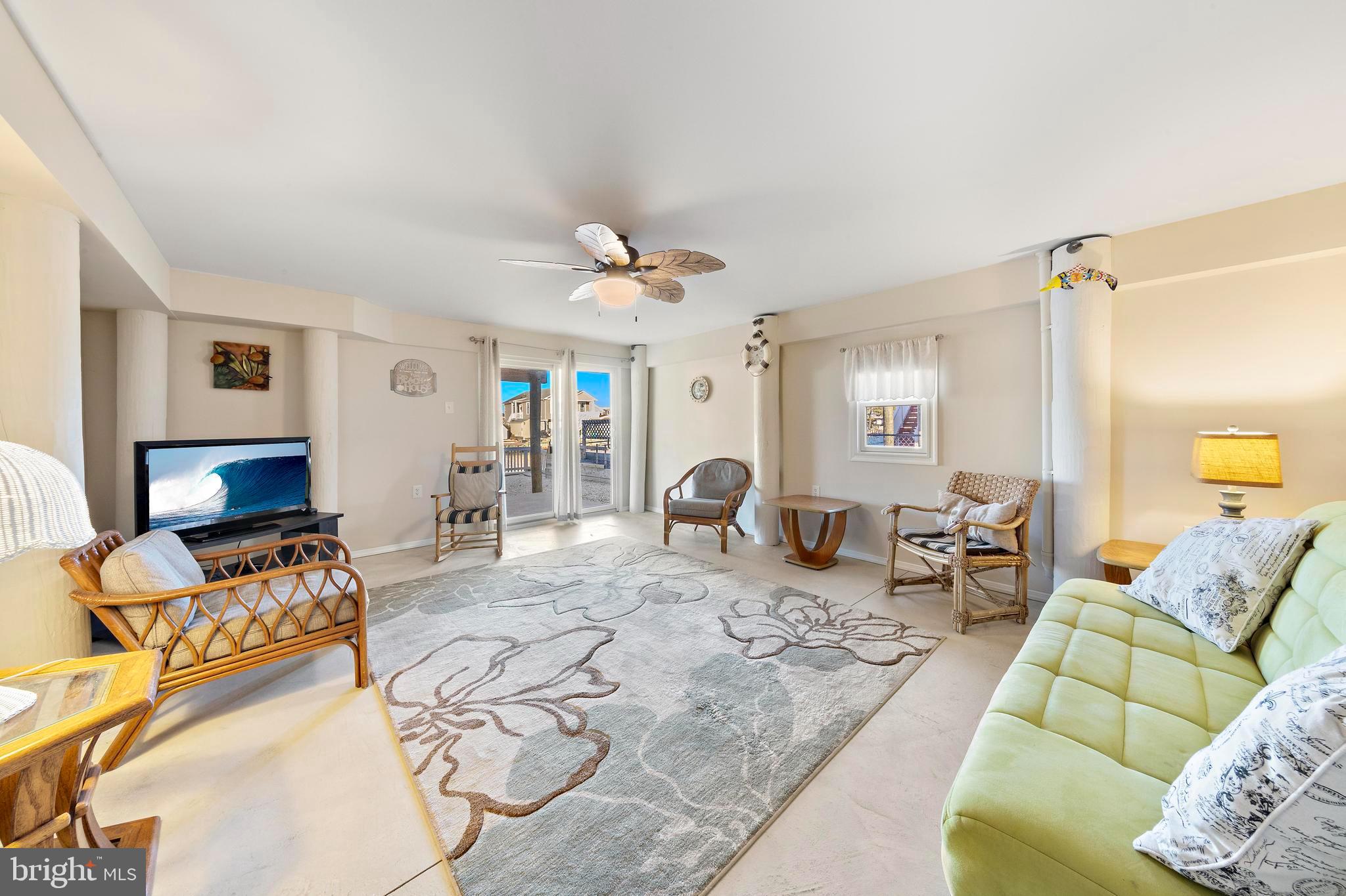 32 West Navasink Drive Little Egg Harbor, NJ 08087 - Photo 48 of 71 a living room with furniture and a wooden floor