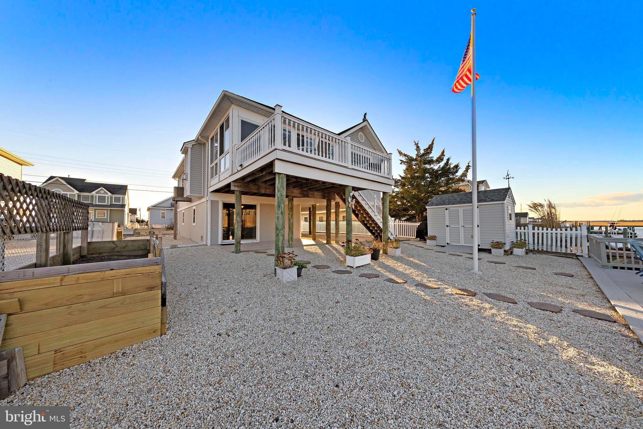 32 West Navasink Drive Little Egg Harbor, NJ 08087 - Photo 54 of 71 a view of a house with a yard
