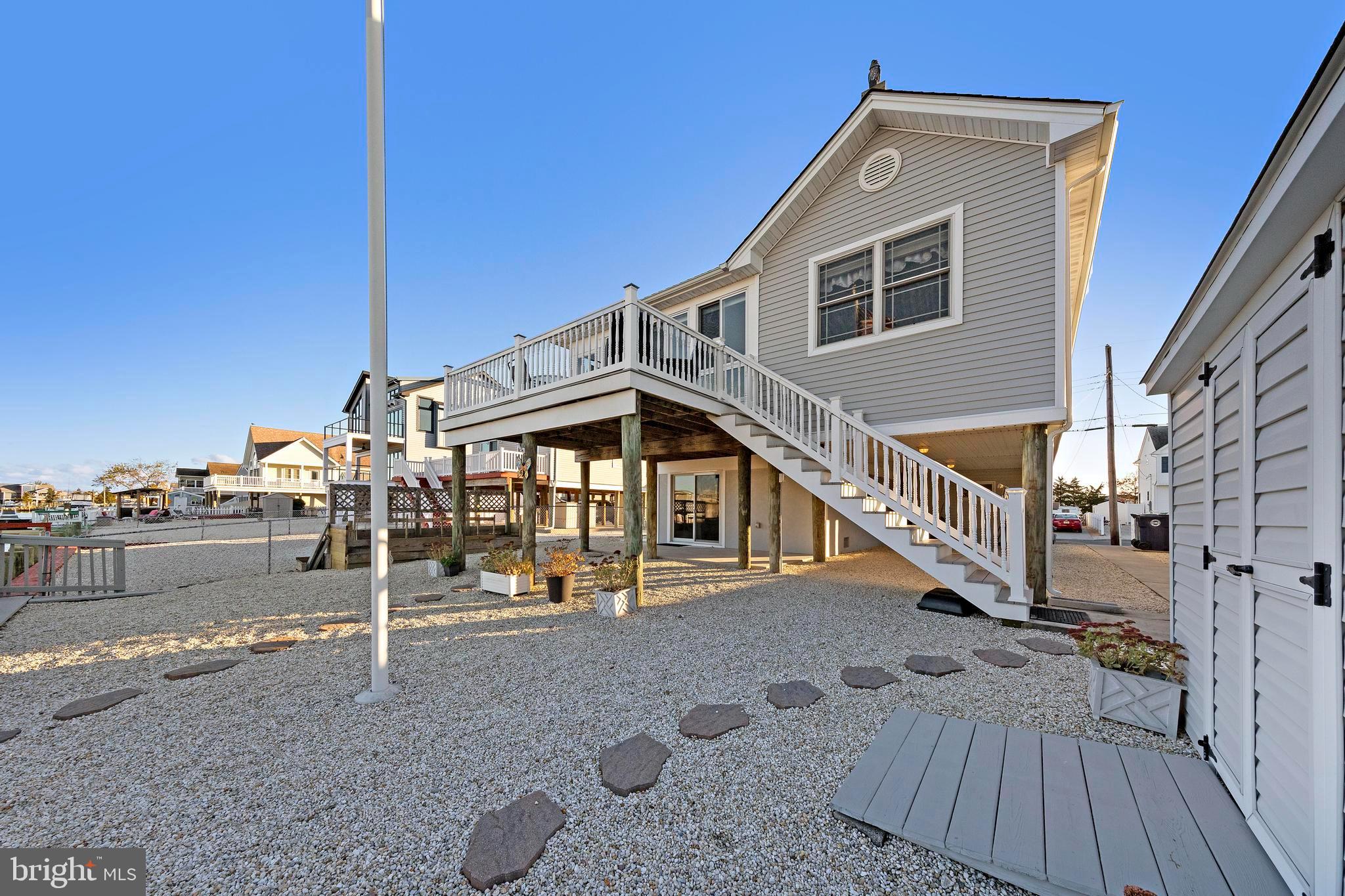32 West Navasink Drive Little Egg Harbor, NJ 08087 - Photo 55 of 71 Charming coastal retreat with inviting deck.