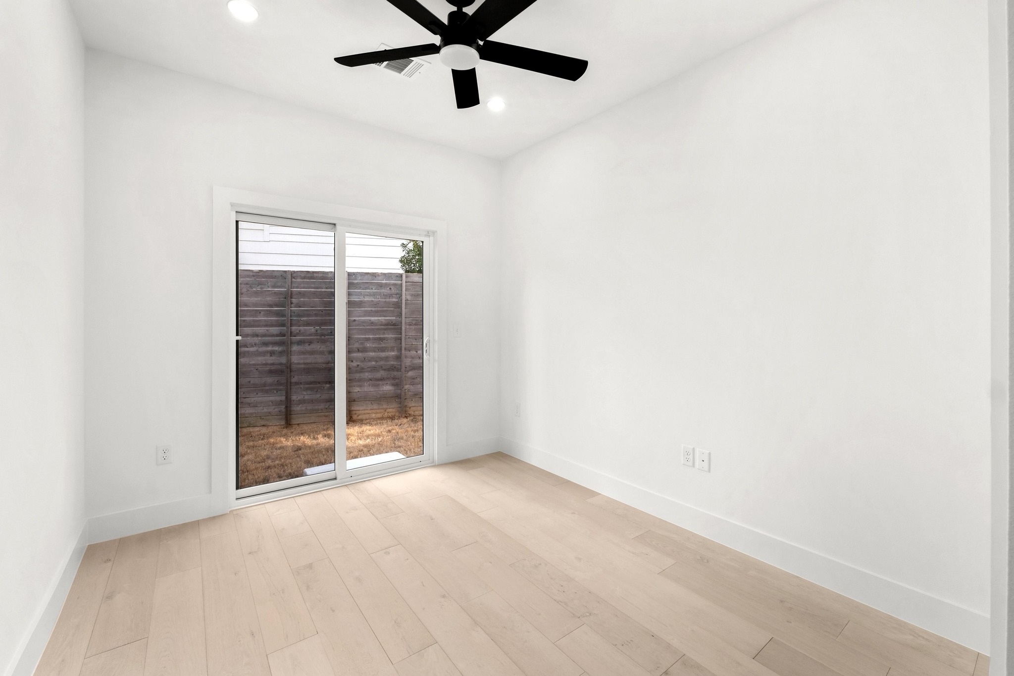 1500 Sylvan Glade, Unit 2A Austin, TX 78745 - Photo 22 of 29 an empty room with closet and windows