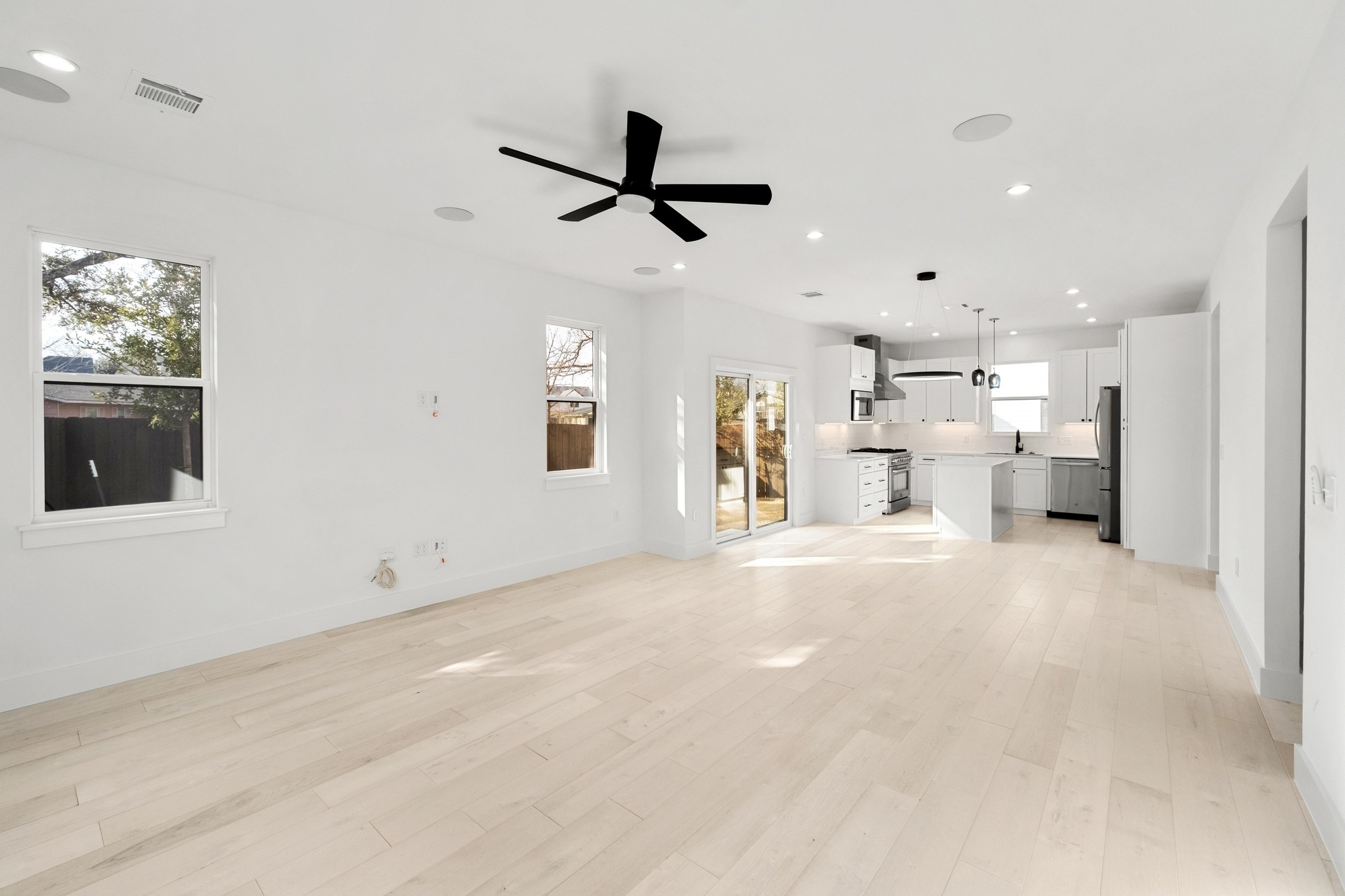1500 Sylvan Glade, Unit 2A Austin, TX 78745 - Photo 7 of 29 a view of a livingroom with furniture and a ceiling fan