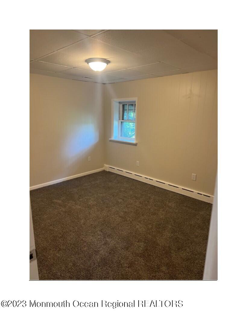 105-107 Atlantic Street Bridgeton, NJ 08302 - Photo 20 of 20 a black and white photo of a big room