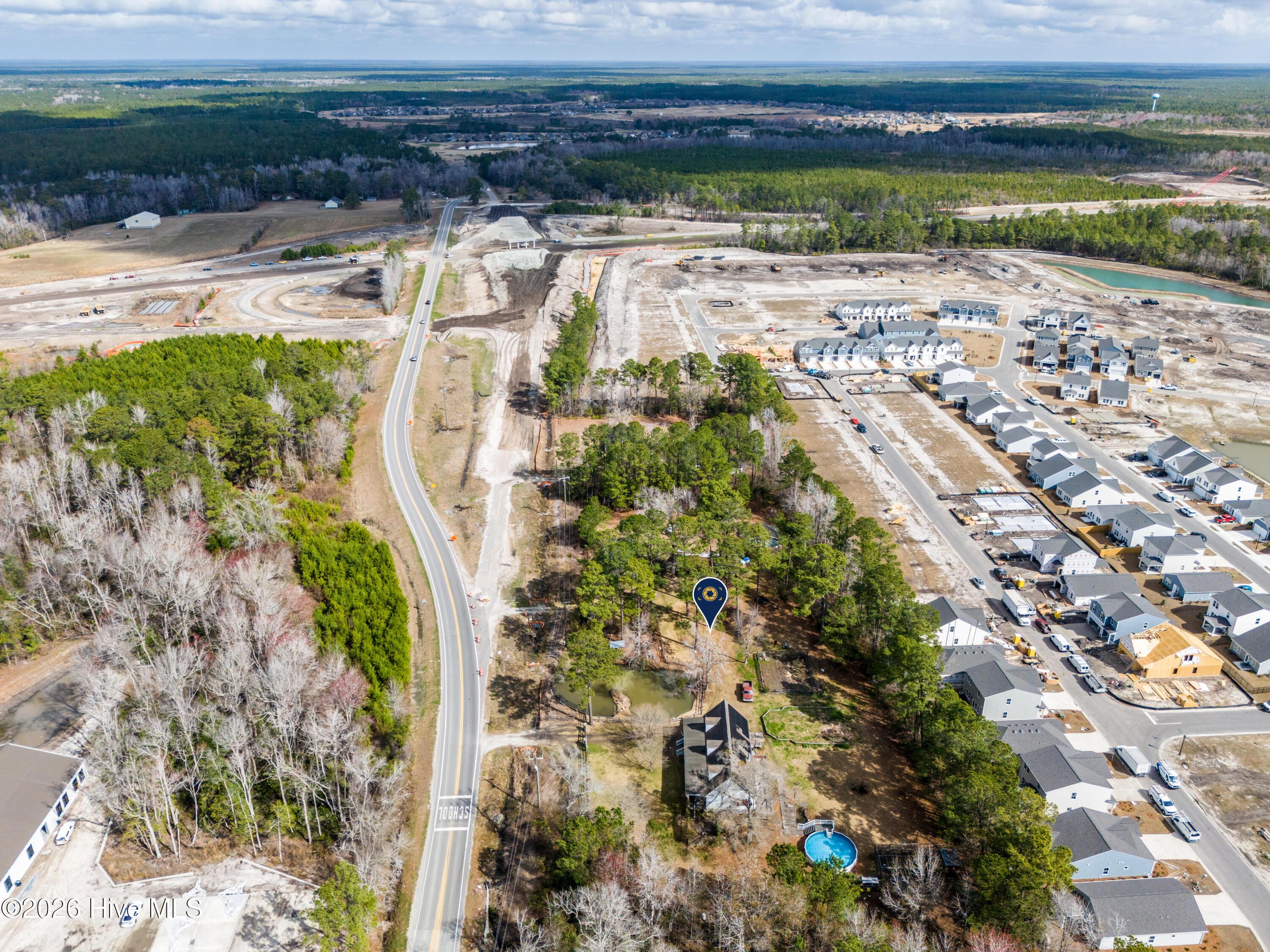 1098 Hoover Road Hampstead, NC 28443 - Photo 2 of 24 DJI_20260305102658_0002_Dp