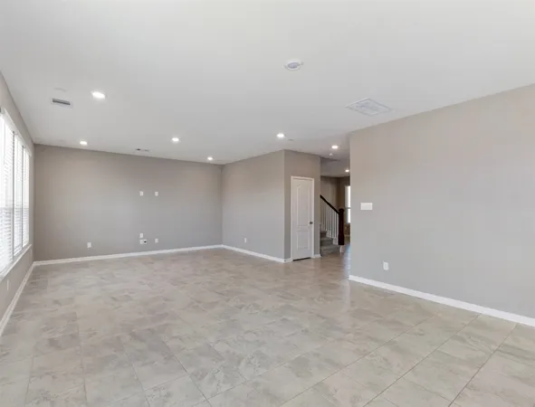 an empty room with an entryway