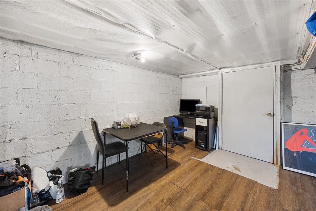 43 Belcourt Road Worcester, MA 01605 - Photo 21 of 26 a workspace with furniture and wooden floor