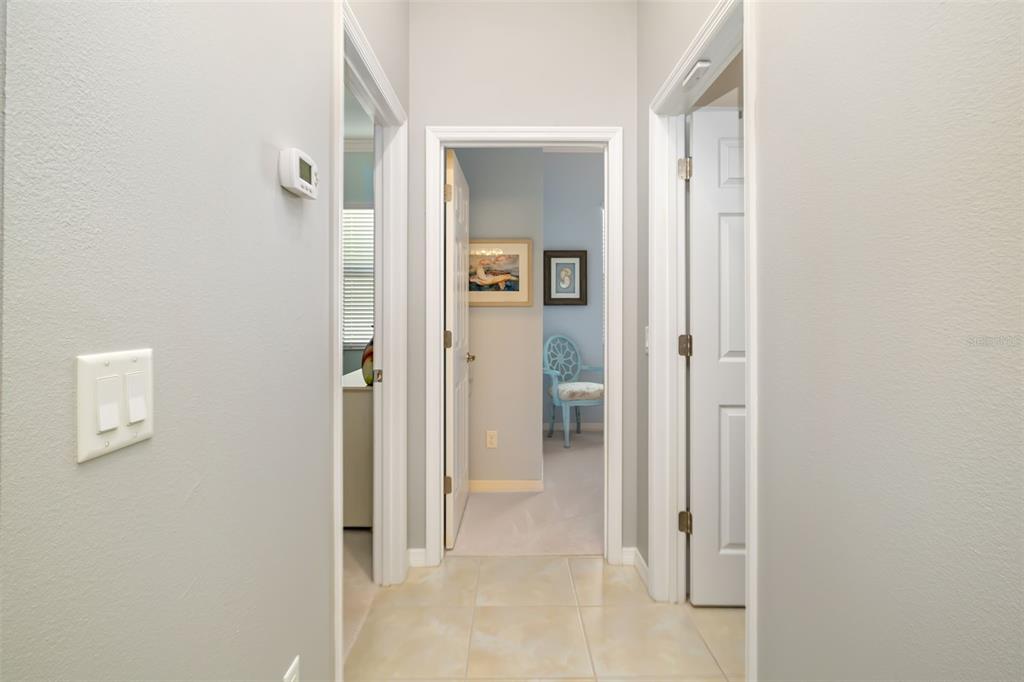 12844 24th St Circle East Parrish, FL 34219 - Photo 15 of 57 a view of a bathroom from a hallway