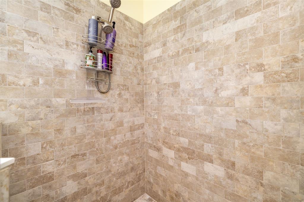 12844 24th St Circle East Parrish, FL 34219 - Photo 23 of 57 a bathroom with a shower