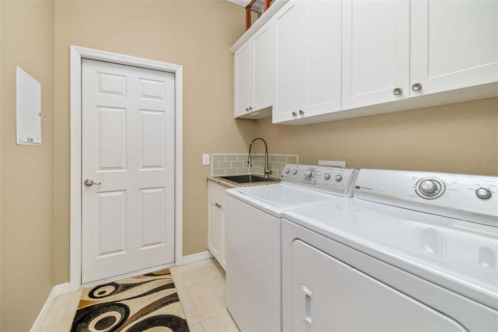 12844 24th St Circle East Parrish, FL 34219 - Photo 31 of 57 a utility room with dryer and washer