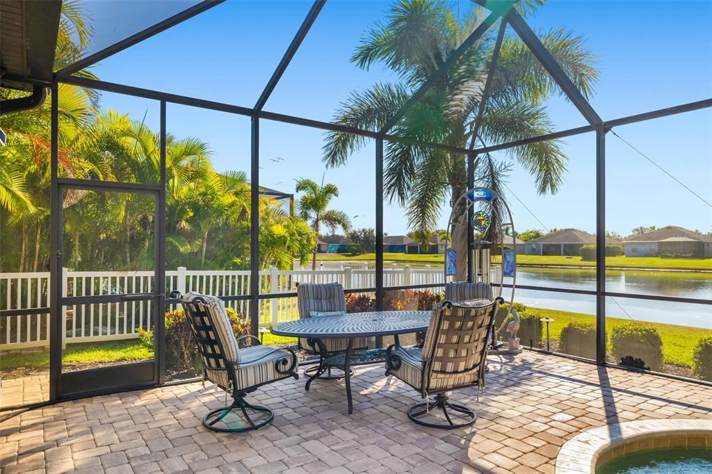 12844 24th St Circle East Parrish, FL 34219 - Photo 38 of 57 a view of a swimming pool with a lounge chair
