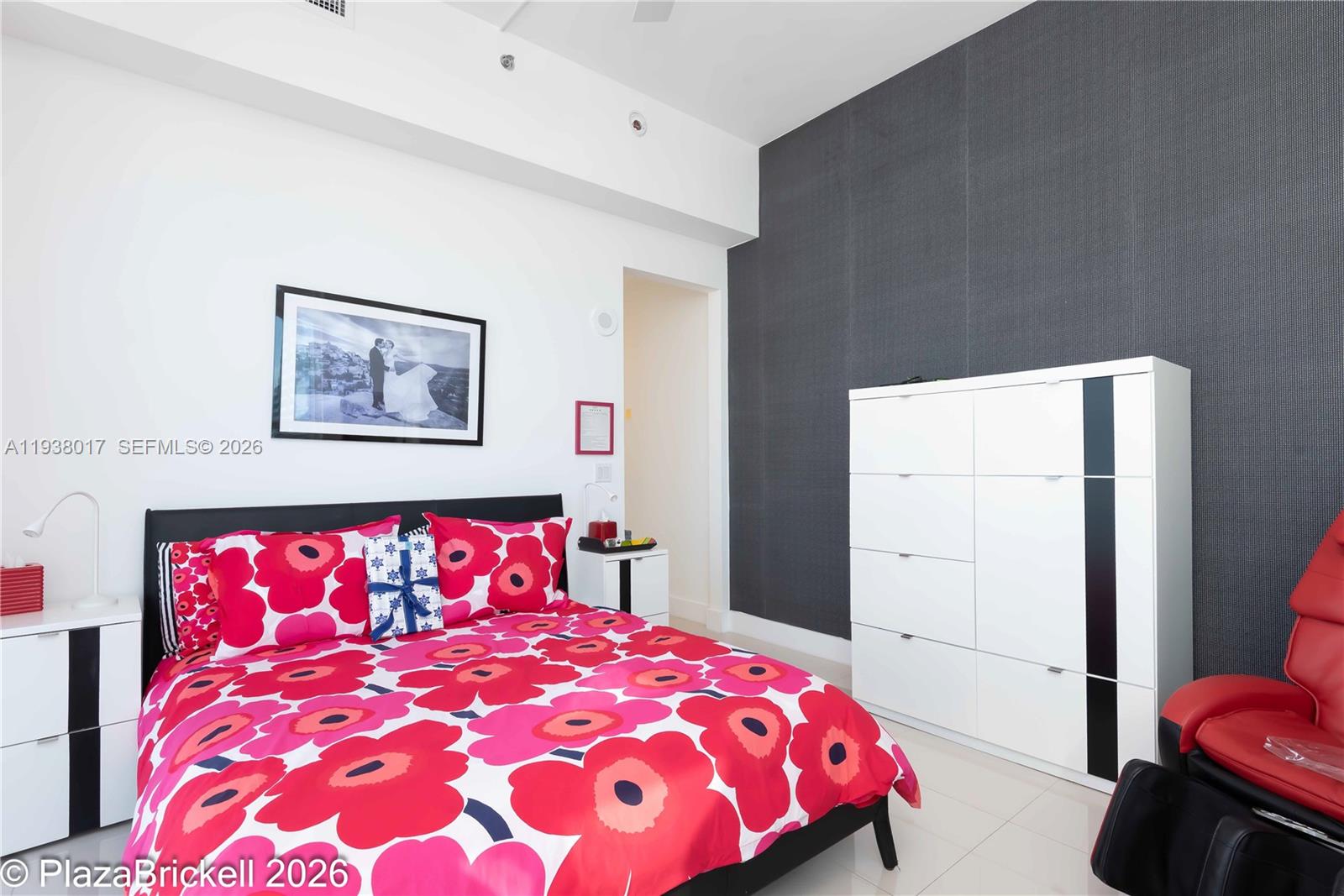 950 Brickell Bay Drive, Unit 5505 Miami, FL 33131 - Photo 21 of 63 Second Bedroom upstairs with lots of light