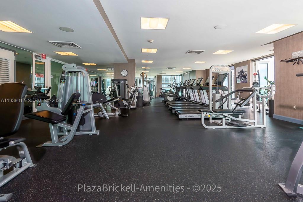 950 Brickell Bay Drive, Unit 5505 Miami, FL 33131 - Photo 54 of 63 a view of a room with gym equipment