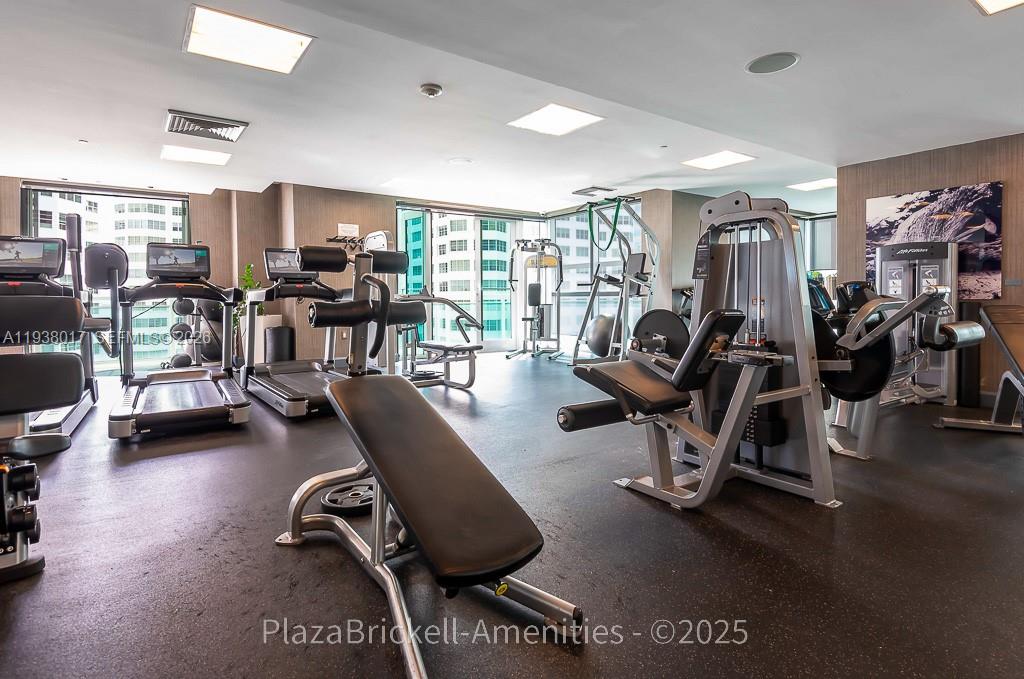 950 Brickell Bay Drive, Unit 5505 Miami, FL 33131 - Photo 55 of 63 a view of a room with gym equipment