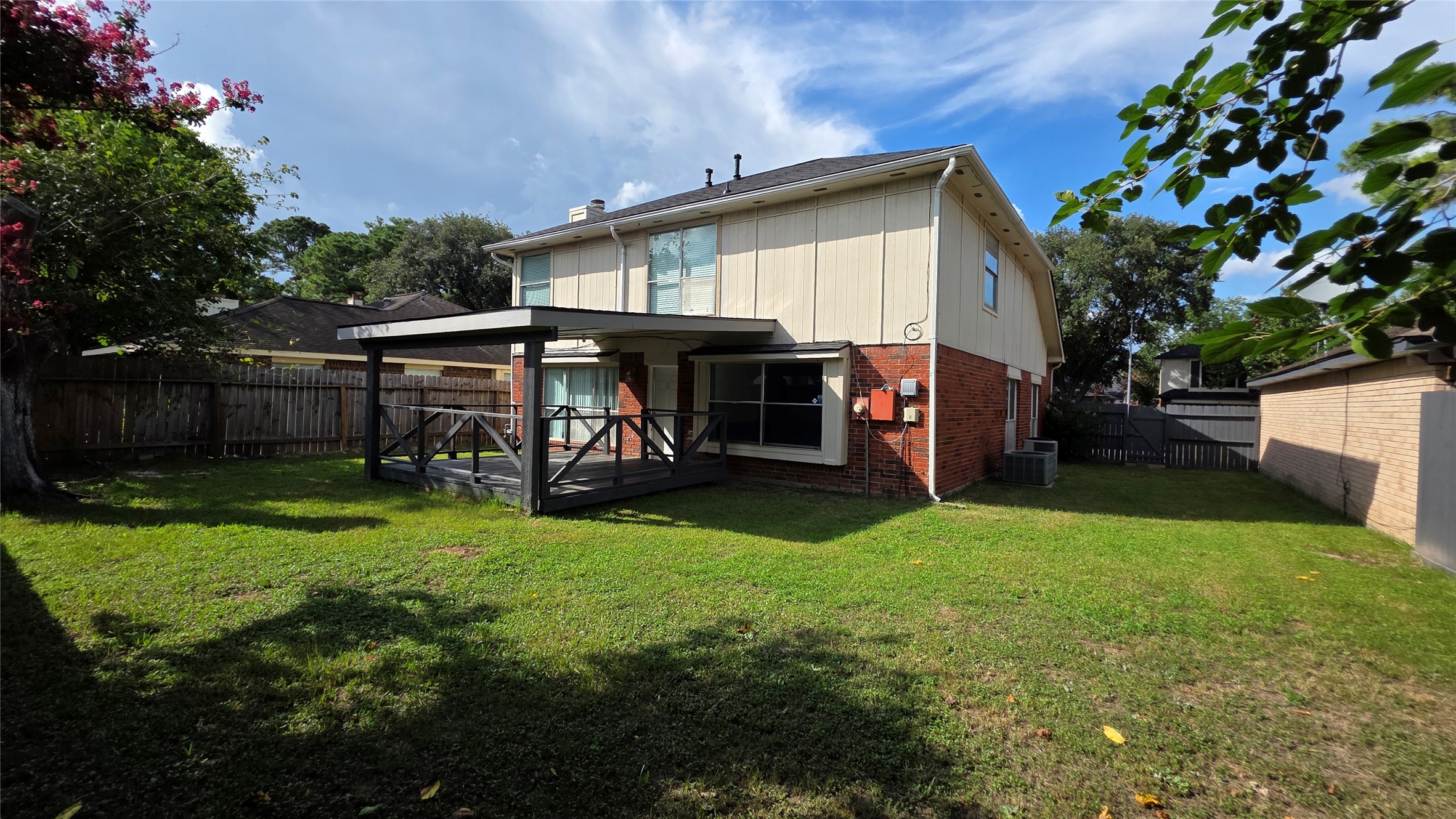 16403 Salinas Lane Houston, TX 77095 - Photo 17 of 17 a view of an house with backyard space and sitting area