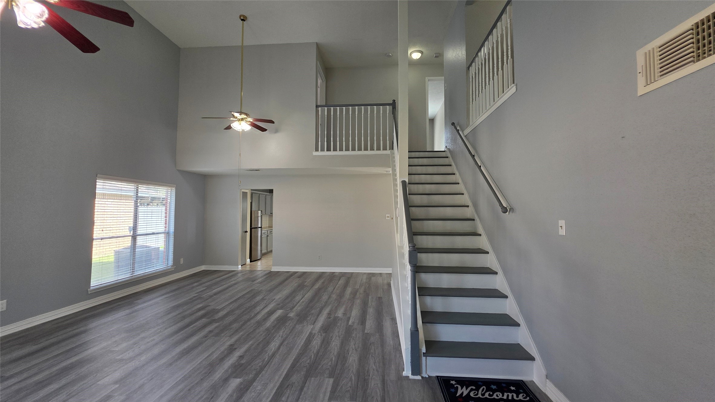 16403 Salinas Lane Houston, TX 77095 - Photo 5 of 17 a view of an entryway with wooden floor