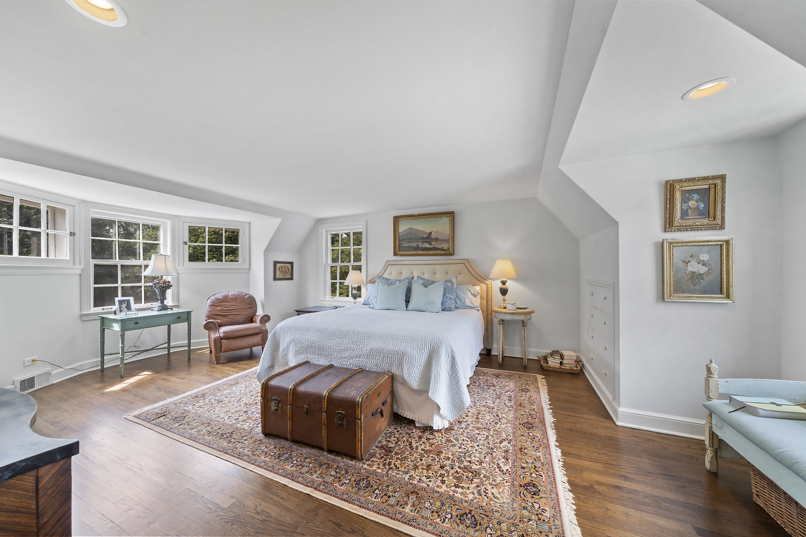 33W627 Army Trail Road Wayne, IL 60184 - Photo 20 of 31 a spacious bedroom with a bed and wooden floor