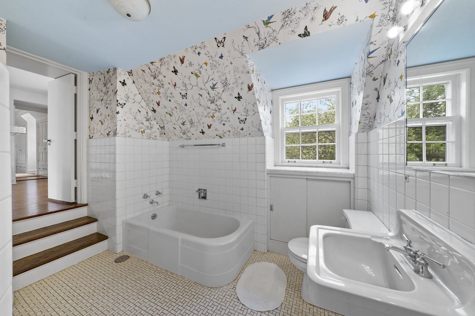 33W627 Army Trail Road Wayne, IL 60184 - Photo 24 of 31 a bathroom with a sink and a bathtub