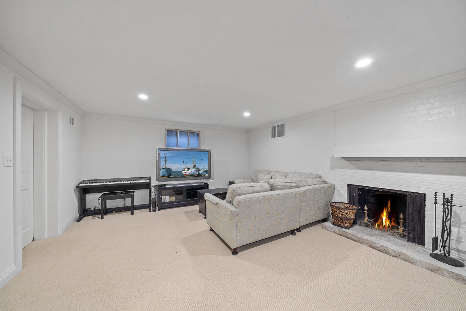 33W627 Army Trail Road Wayne, IL 60184 - Photo 28 of 31 a living room with furniture and a fireplace