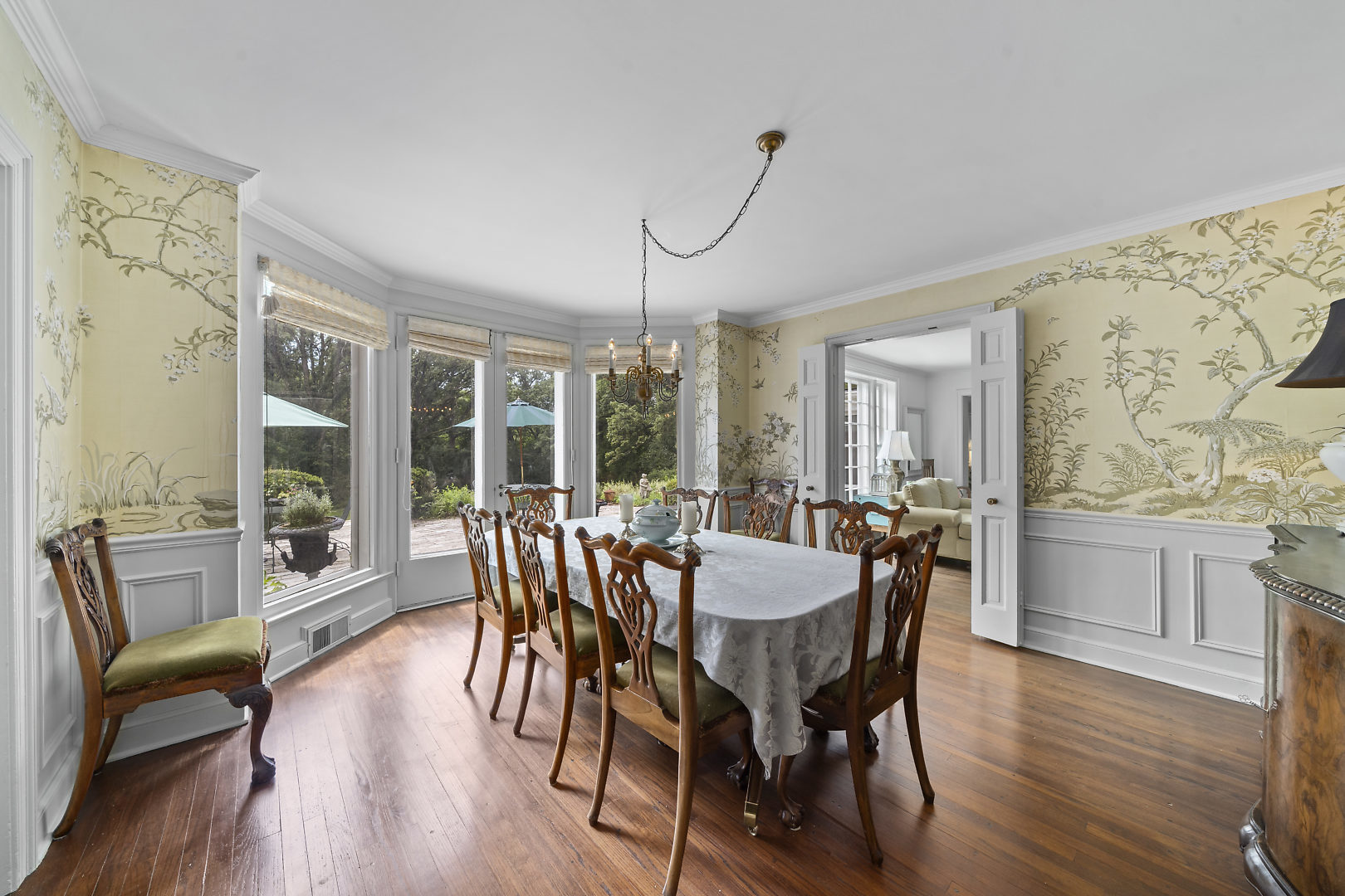 33W627 Army Trail Road Wayne, IL 60184 - Photo 5 of 31 a view of a dining room with furniture window and wooden floor
