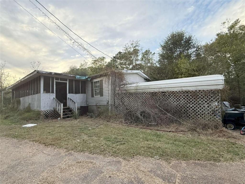 a backyard of a house with lots of green space