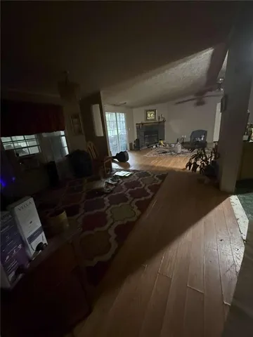 a bed sitting in a room next to a window