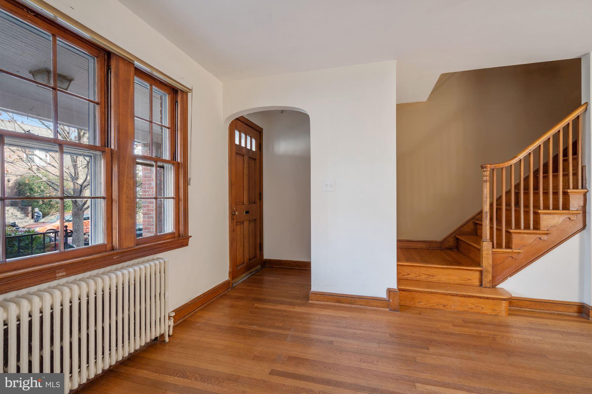 1403 K Street Southeast Washington, DC 20003 - Photo 20 of 74 a view of a hallway with wooden floor and entryway