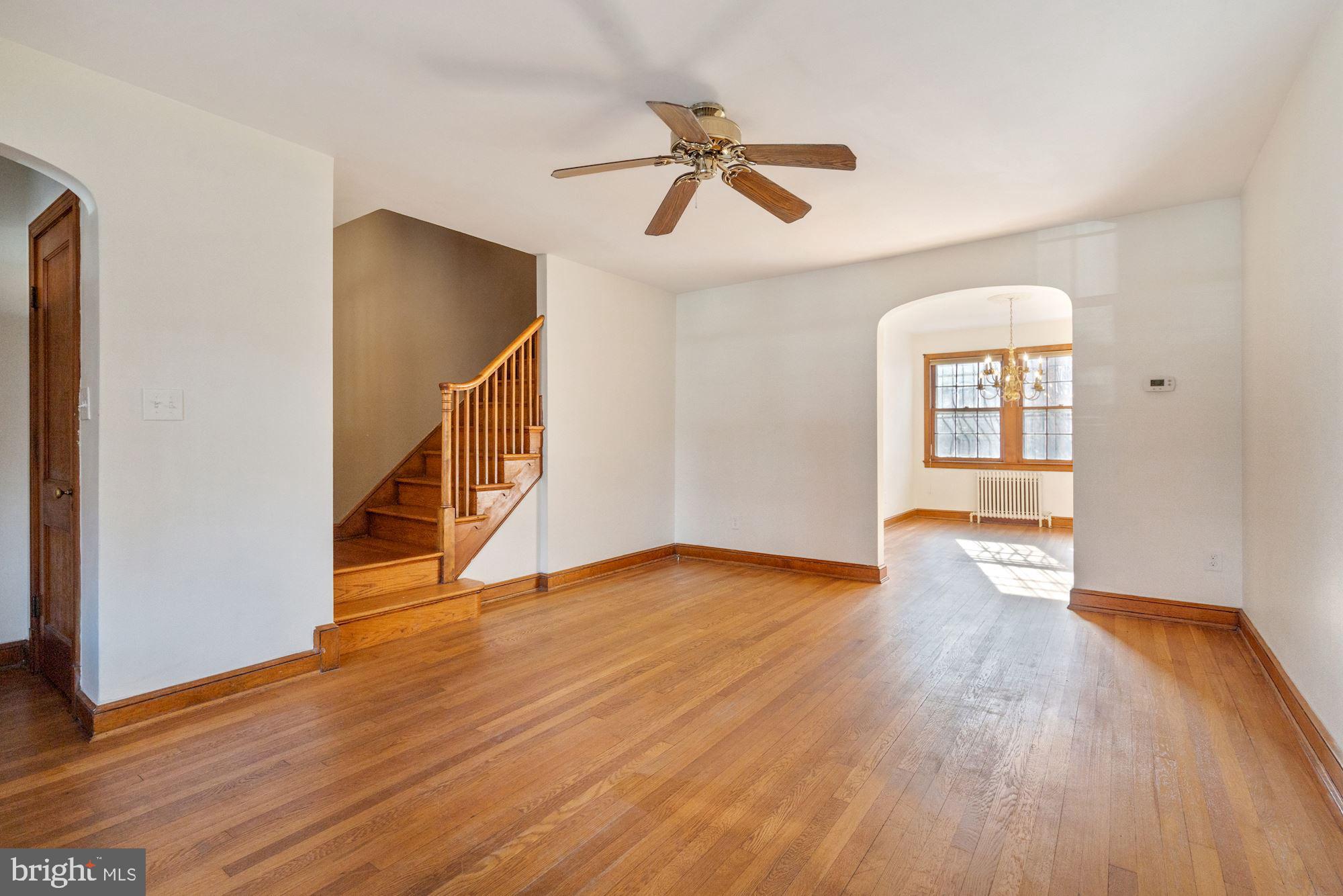 1403 K Street Southeast Washington, DC 20003 - Photo 22 of 74 a view of an empty room with wooden floor and a window