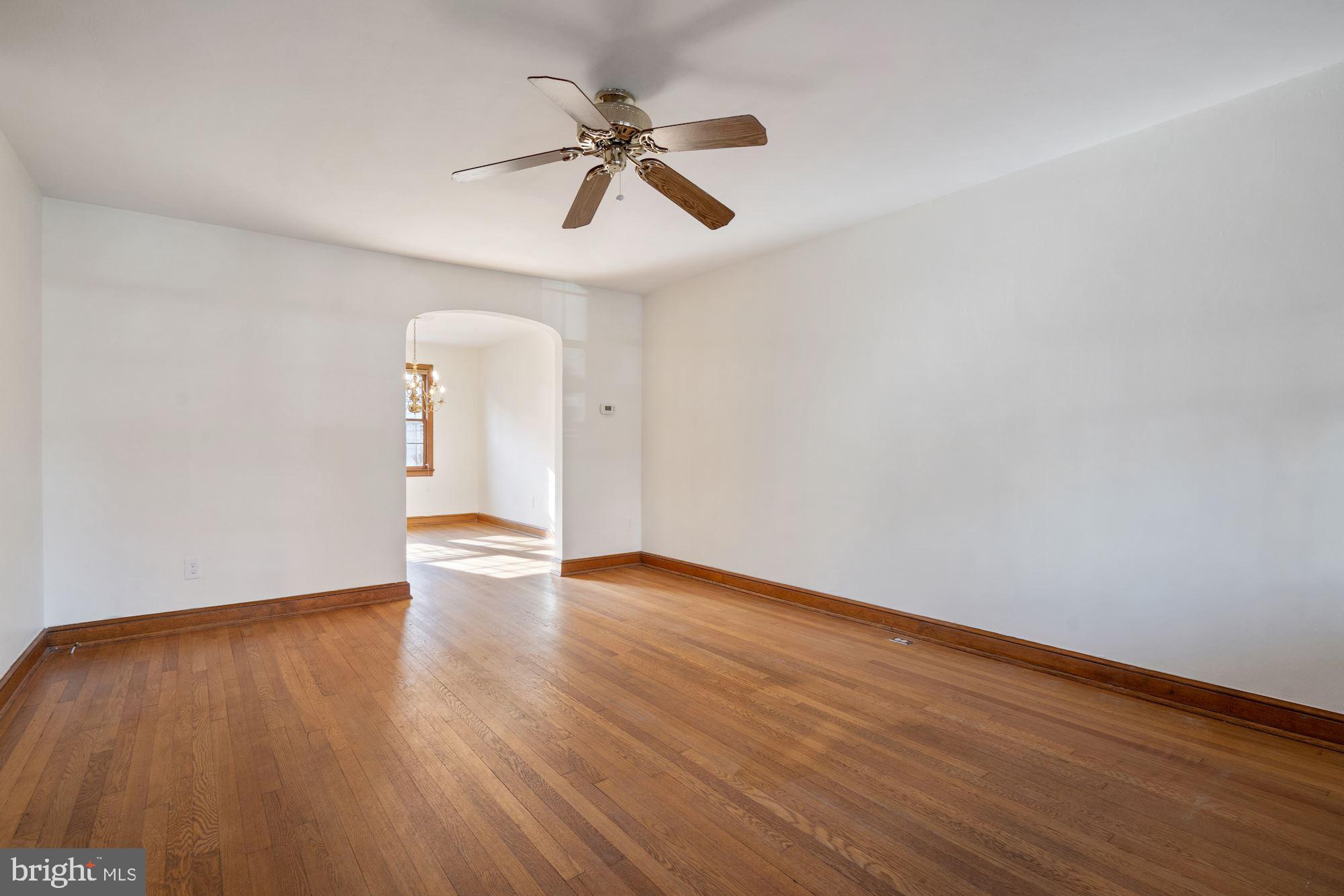 1403 K Street Southeast Washington, DC 20003 - Photo 23 of 74 a view of room with hardwood floor and a ceiling fan