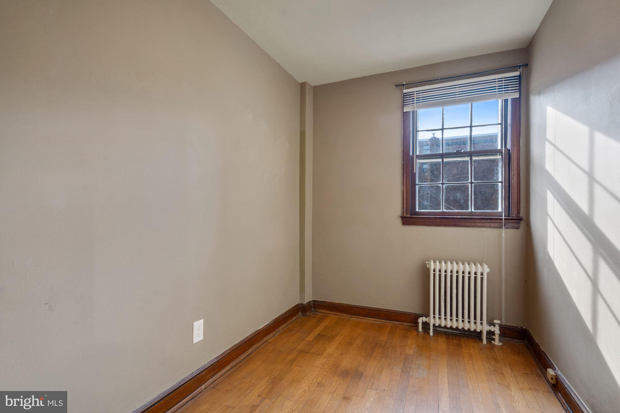 1403 K Street Southeast Washington, DC 20003 - Photo 34 of 74 a view of an empty room with a window
