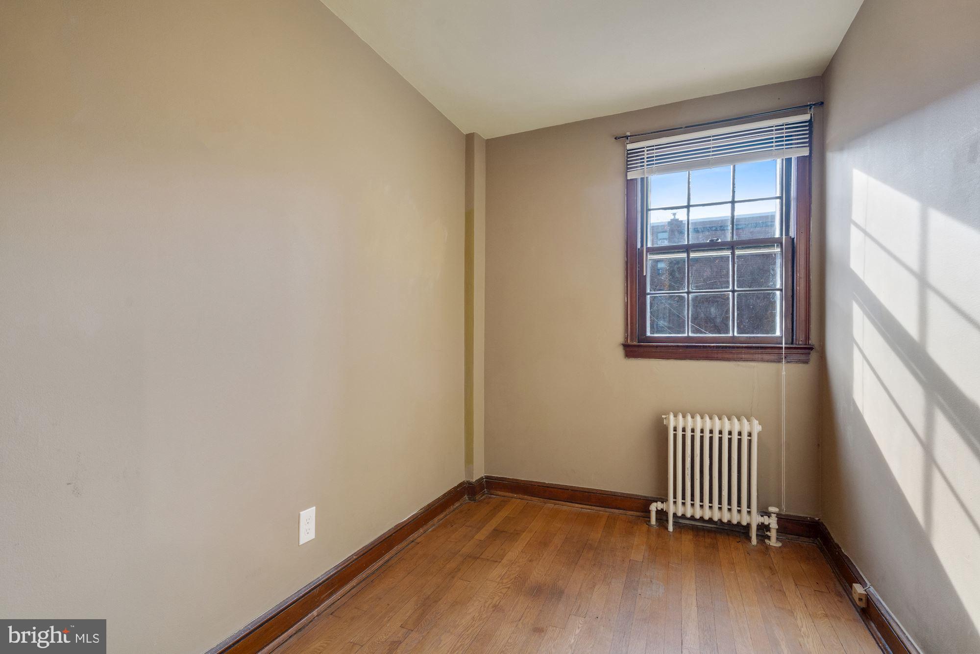 1403 K Street Southeast Washington, DC 20003 - Photo 36 of 74 an empty room with a window