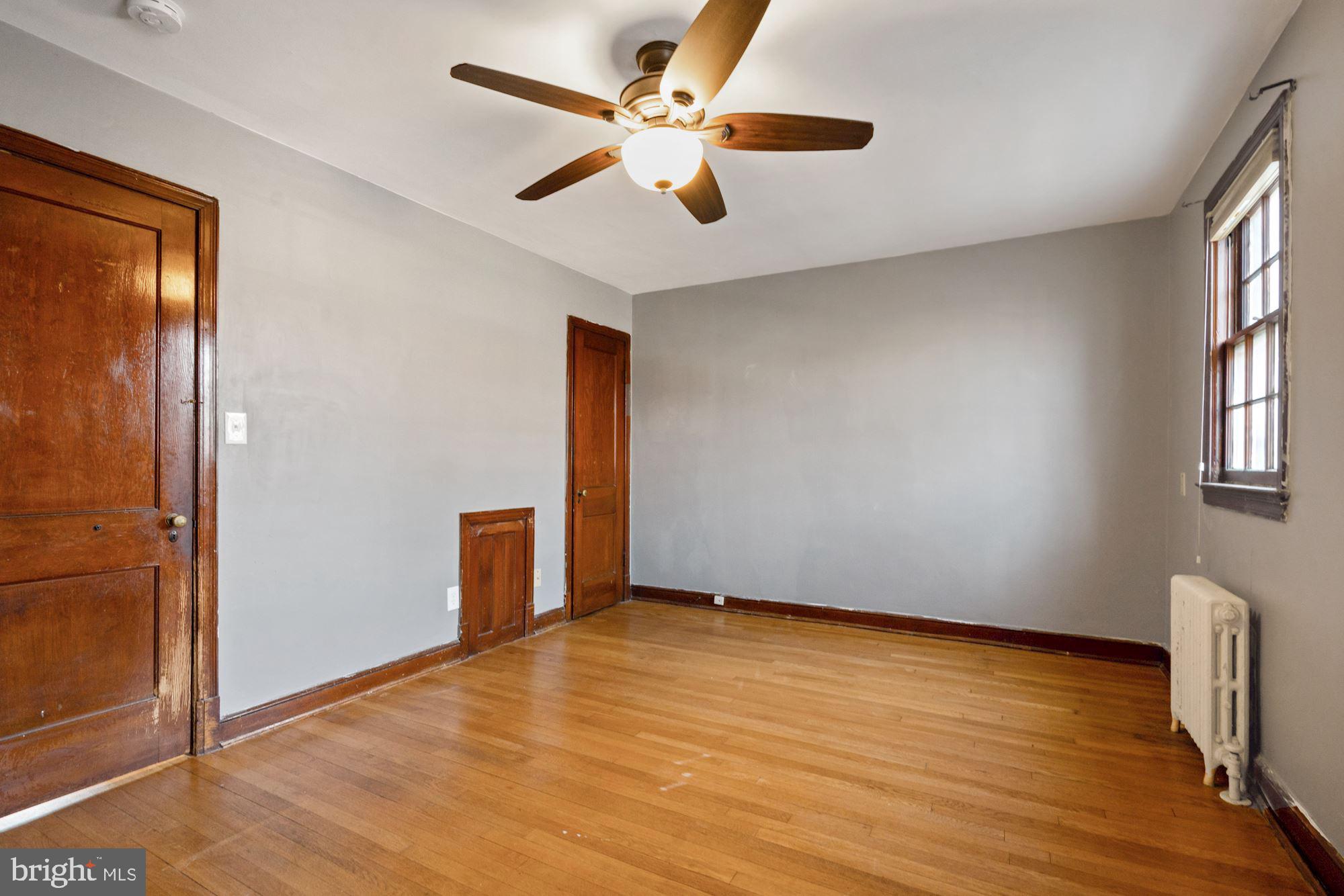 1403 K Street Southeast Washington, DC 20003 - Photo 46 of 74 wooden floor in an empty room with a window