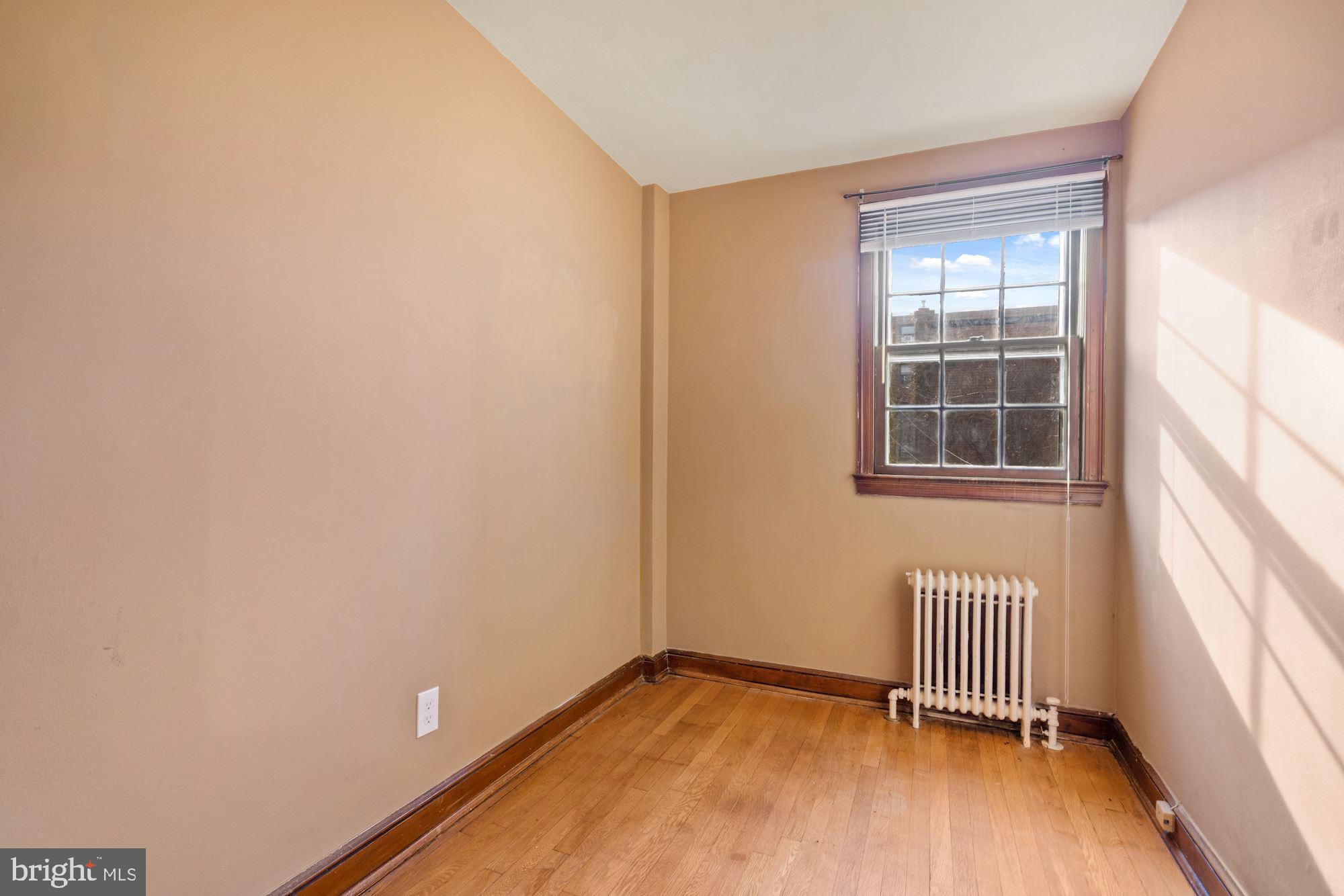 1403 K Street Southeast Washington, DC 20003 - Photo 49 of 74 an empty room with a window