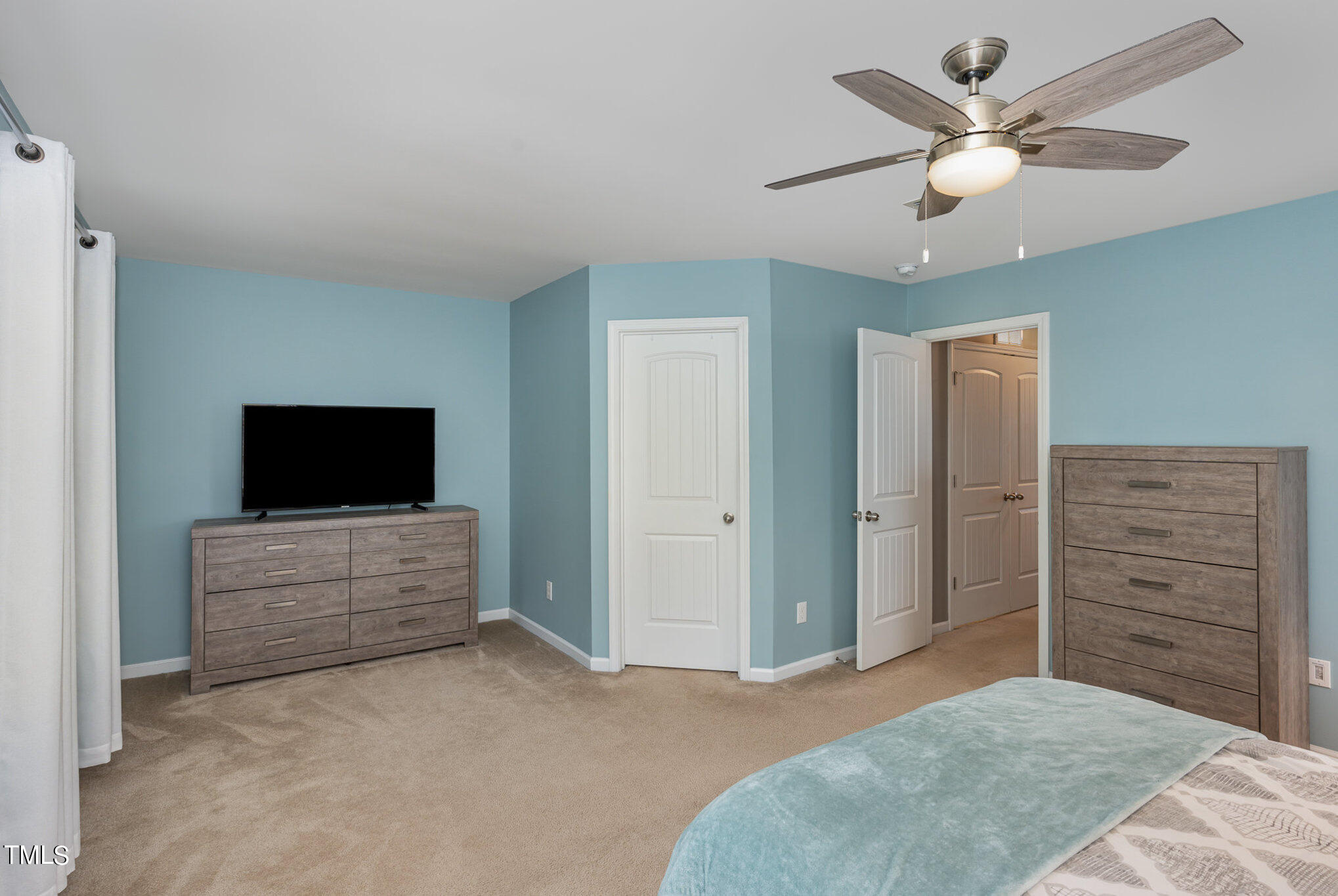3743 Landshire View Lane Raleigh, NC 27616 - Photo 14 of 28 a living room with furniture and a flat screen tv
