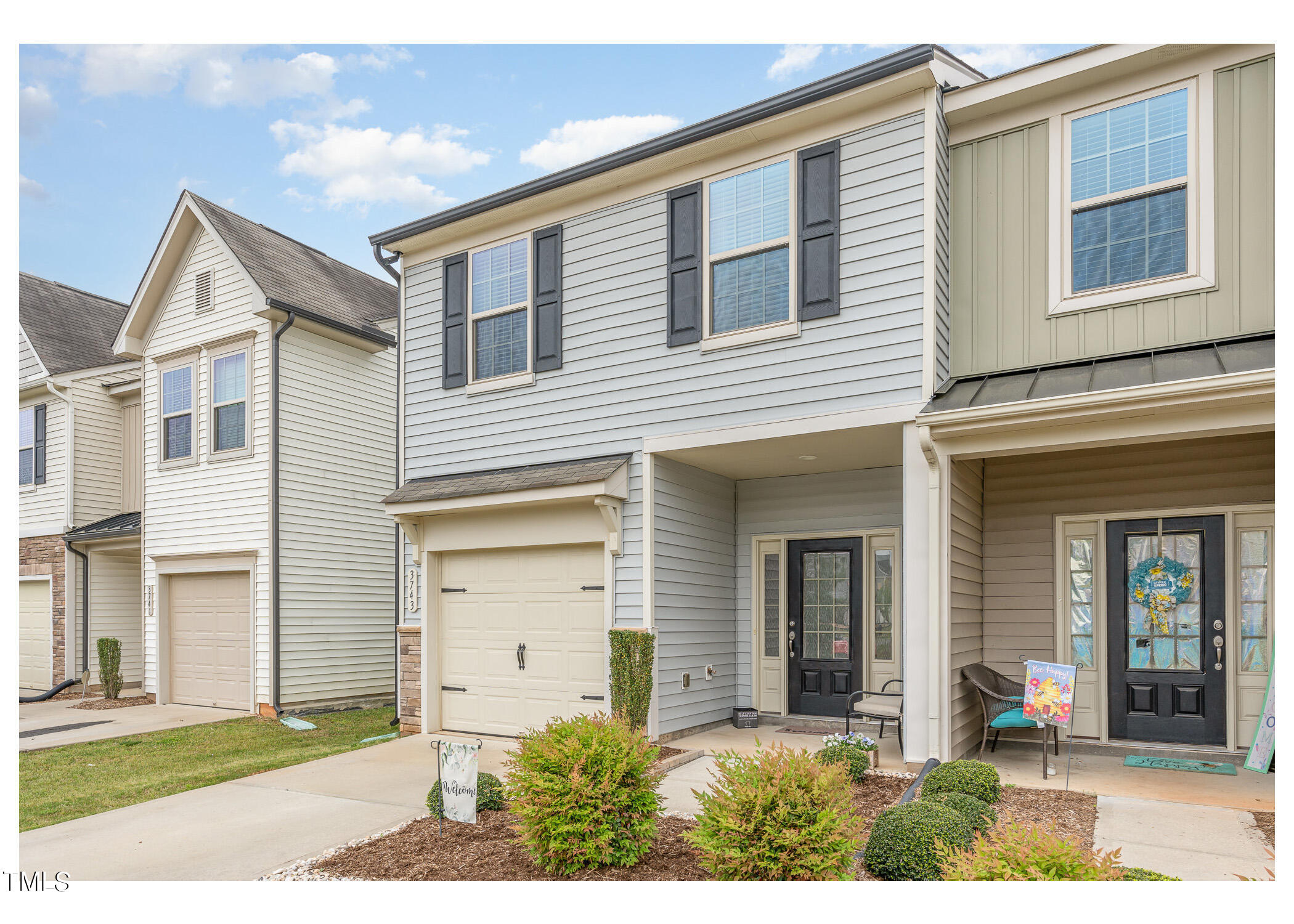 3743 Landshire View Lane Raleigh, NC 27616 - Photo 2 of 28 a front view of a house with a yard