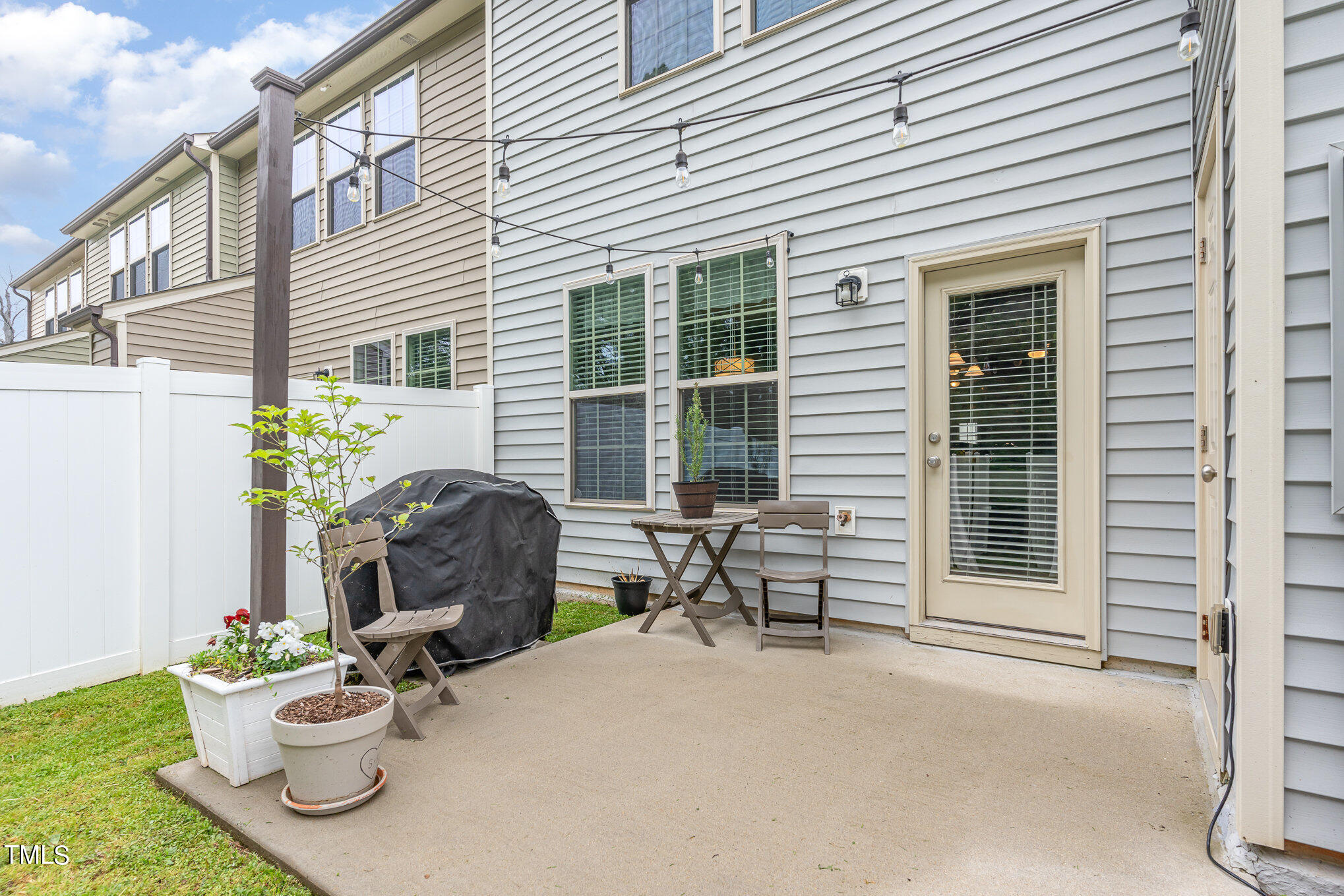 3743 Landshire View Lane Raleigh, NC 27616 - Photo 23 of 28 a view of a chair and table in back of the house