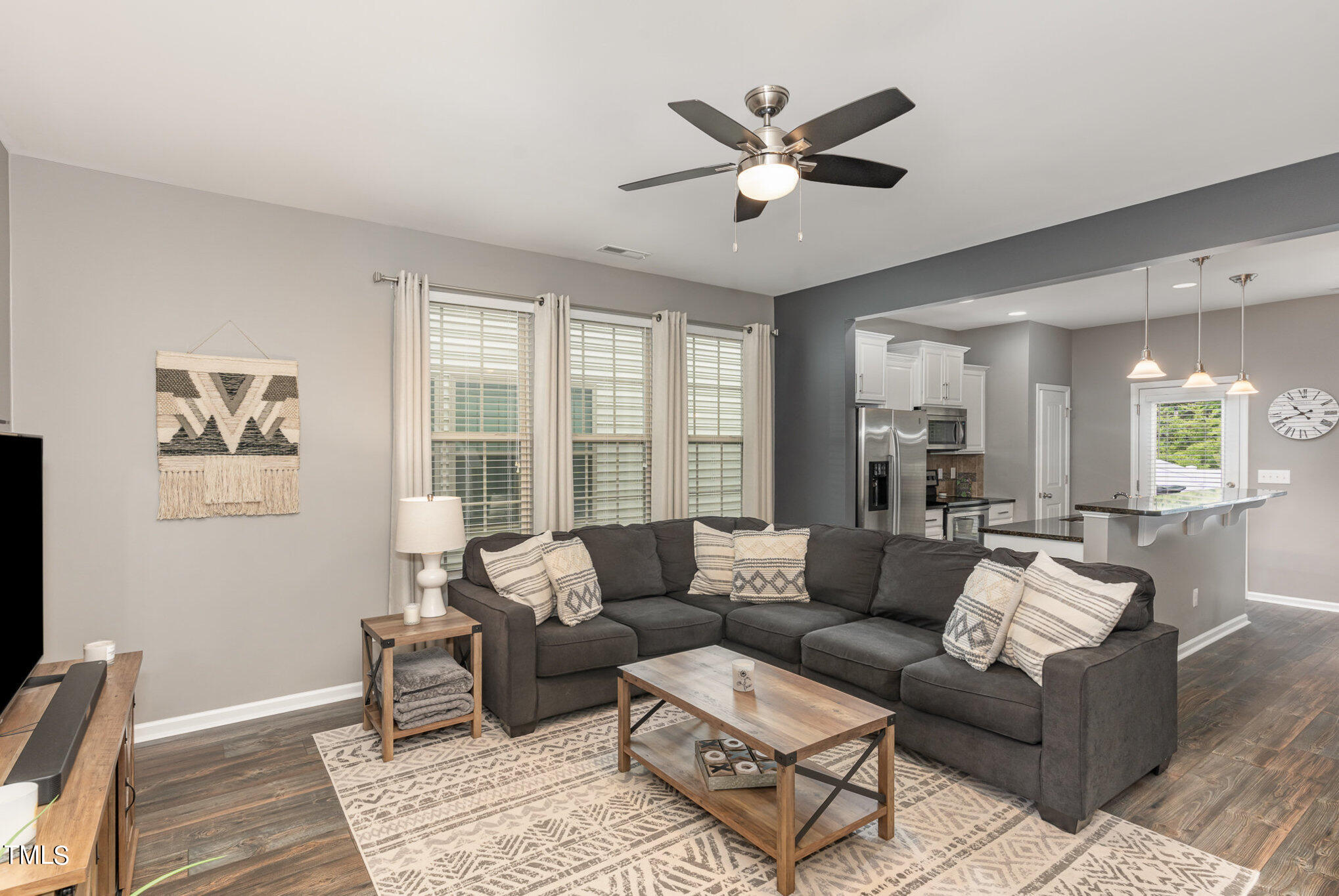 3743 Landshire View Lane Raleigh, NC 27616 - Photo 5 of 28 a living room with furniture and a large window