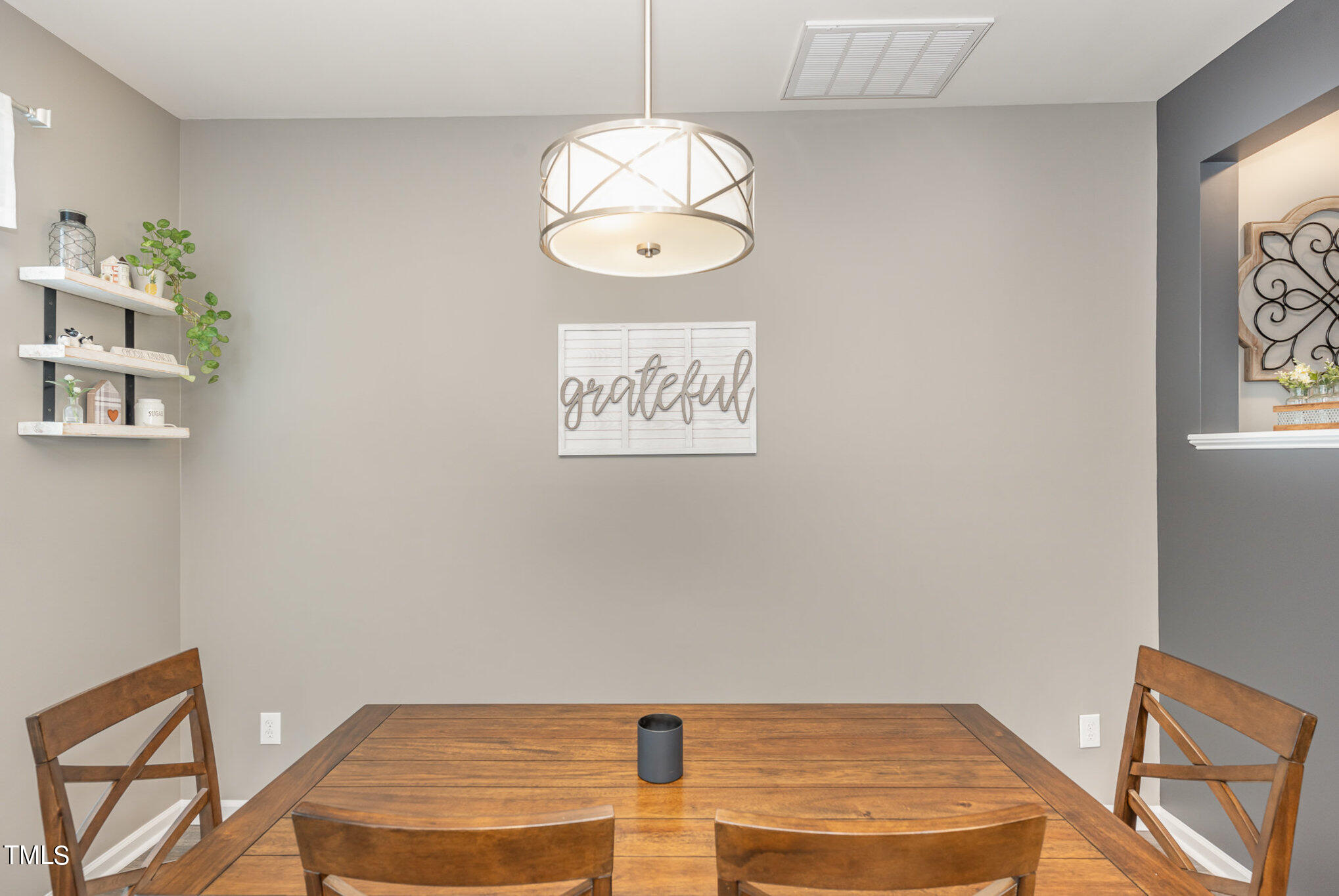3743 Landshire View Lane Raleigh, NC 27616 - Photo 7 of 28 a view of a room with window and wooden floor