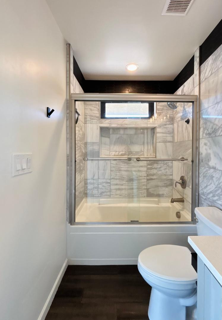 1750 West Pearce Road Phoenix, AZ 85041 - Photo 29 of 39 a bathroom with a shower and a toilet