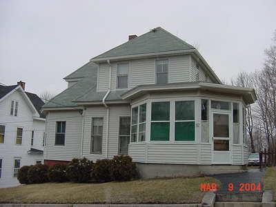 82 Reynolds Street Killingly, CT 06239 - Photo 1 of 1 a front view of a house with a porch