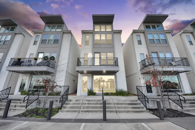 a front view of a building with street view