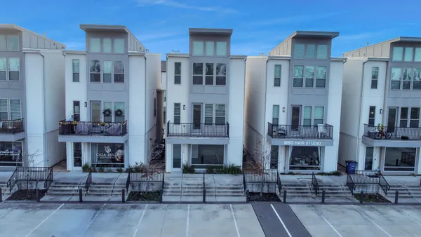 a view of a building and a street