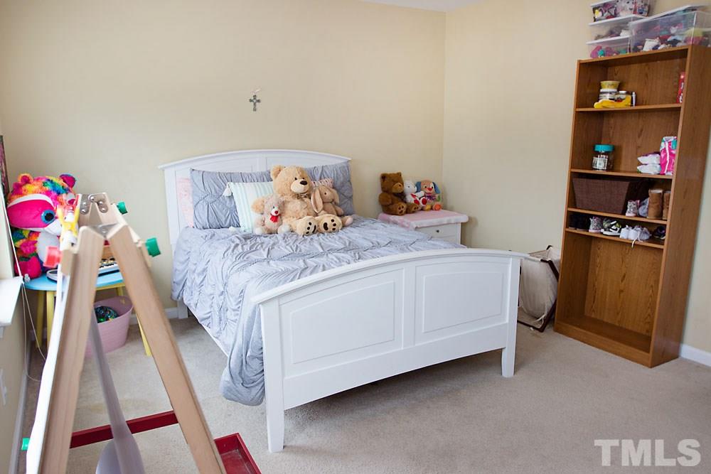 3537 Londonville Lane Raleigh, NC 27604 - Photo 12 of 21 a bedroom with a bed and closet
